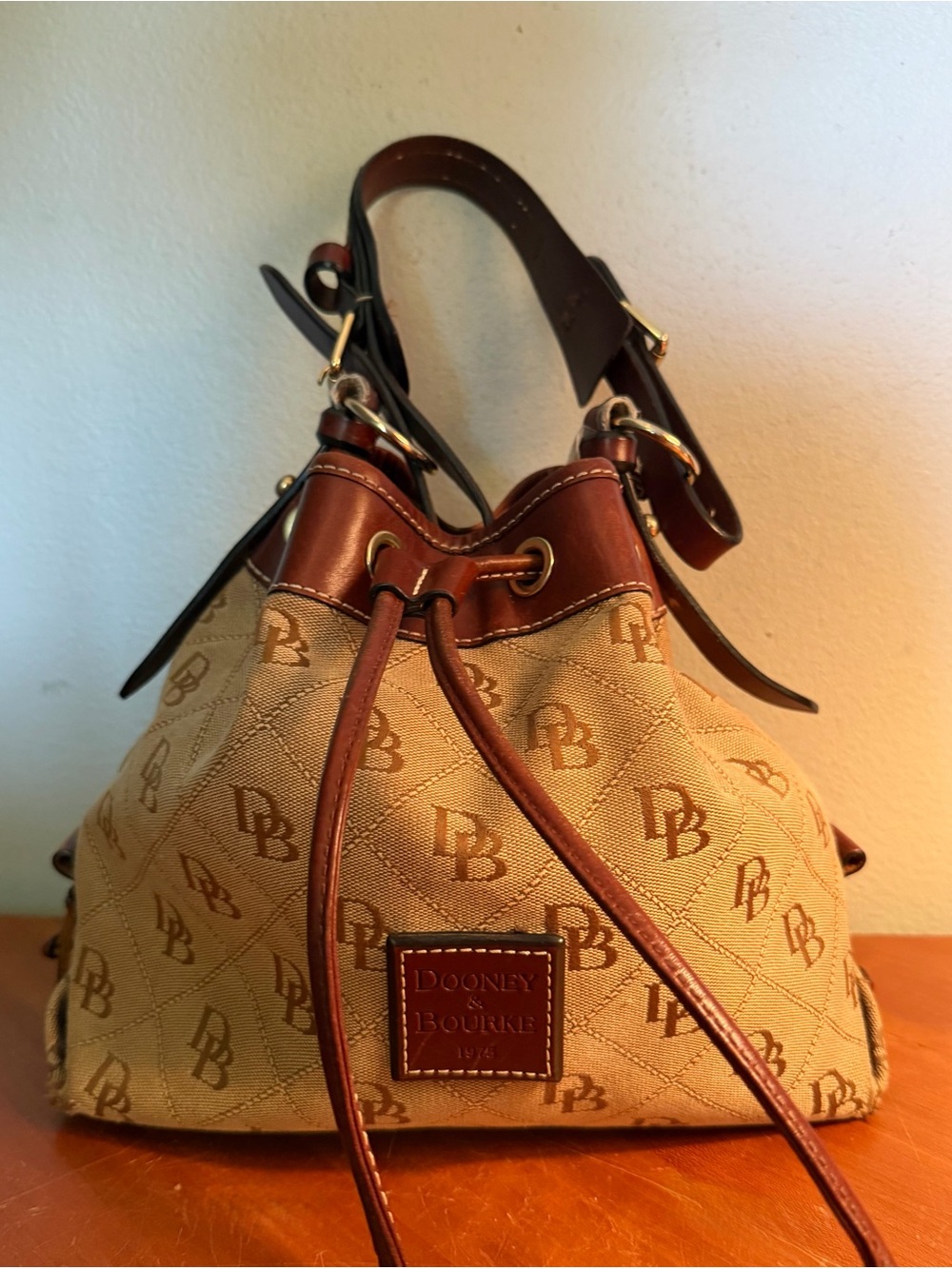 Vintage Dooney & Bourke Monogram Canvas & Leather Drawstring Bucket Bag